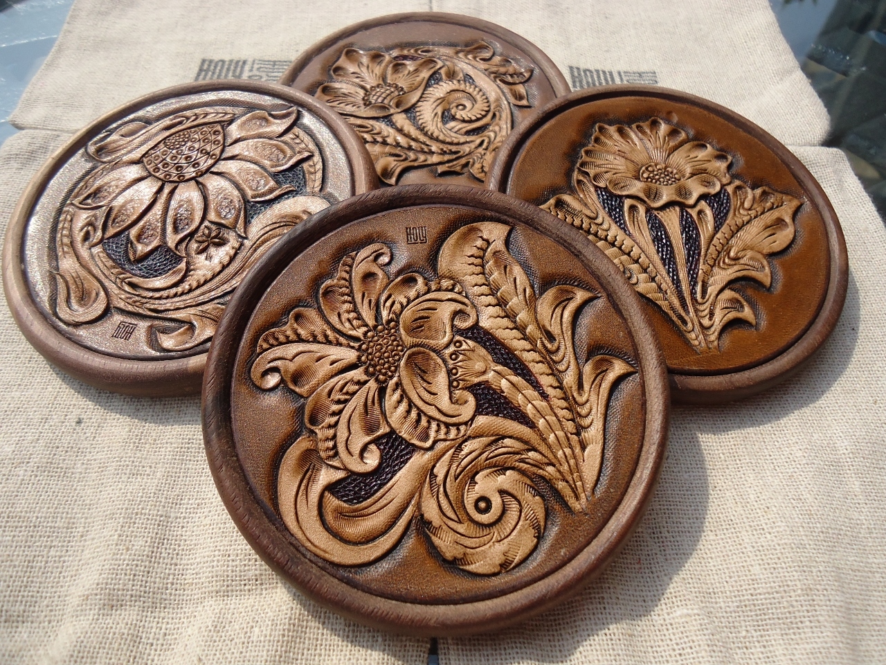 <p>Yu Family 'Holy' Leather and Wood Coaster</p>
